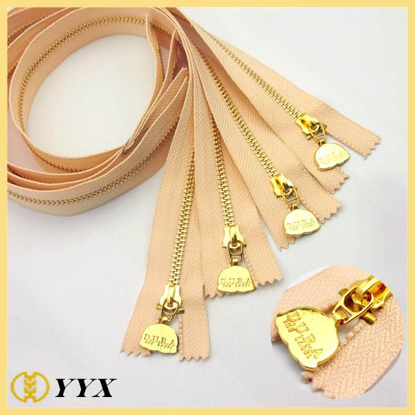 high polished gold metal zipper roll